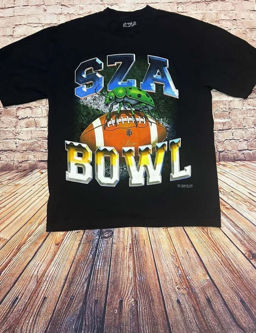 SZA Bowl Tee - Black Cotton NFL T-Shirt